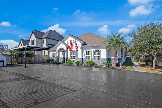 view of front of home featuring a carport