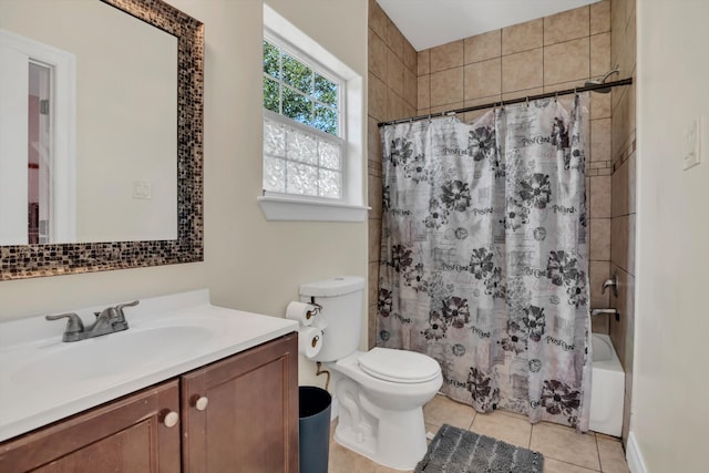 full bathroom featuring vanity, toilet, shower / bathtub combination with curtain, and tile patterned flooring