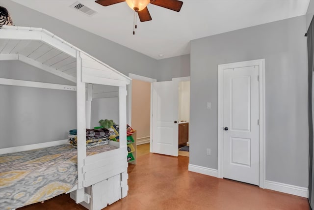 bedroom featuring ceiling fan, lofted ceiling, and concrete floors