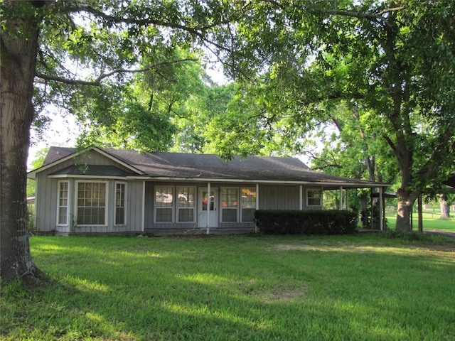 ranch-style house with a front yard