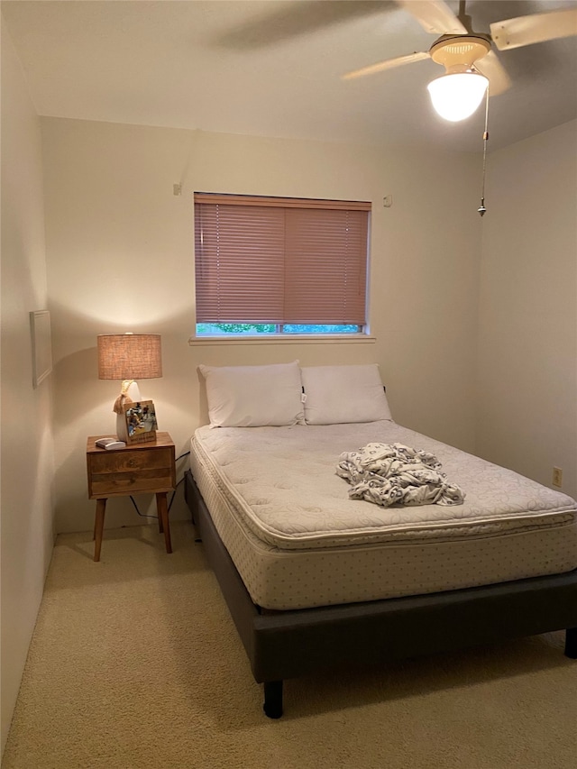 bedroom with carpet and ceiling fan