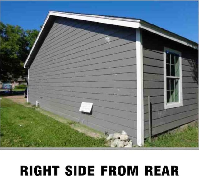 5417 Caplin St, Houston, TX 77026 - view of side of property featuring a yard