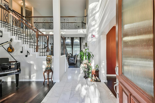 entryway with a high ceiling