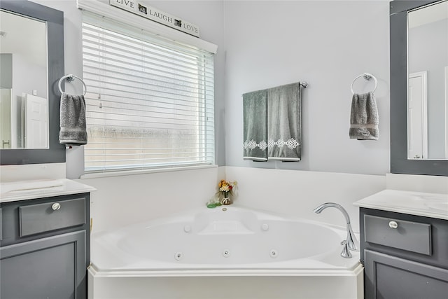 bathroom featuring a bathing tub and vanity