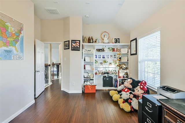 game room with lofted ceiling and dark hardwood / wood-style flooring