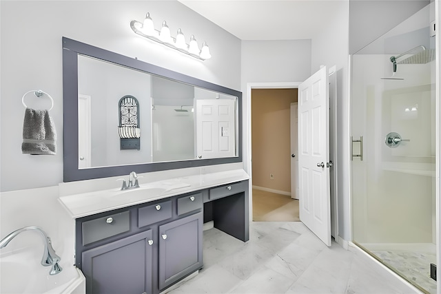 bathroom with a shower with door and vanity