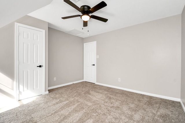 interior space featuring carpet floors and ceiling fan