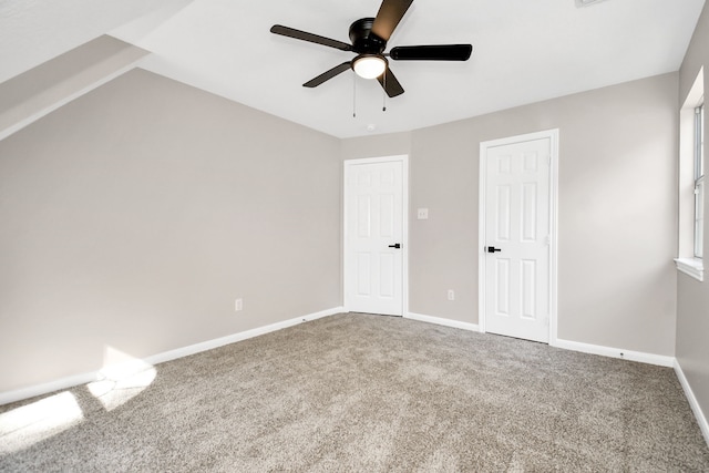 unfurnished bedroom featuring carpet flooring and ceiling fan