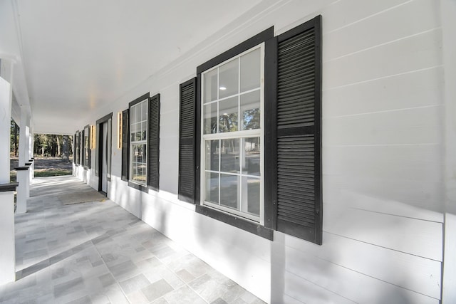 view of patio featuring covered porch