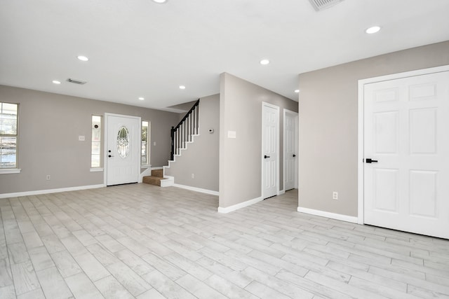 foyer featuring light wood-type flooring