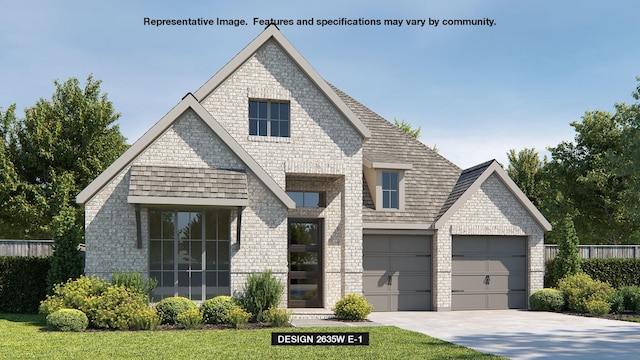 view of front facade featuring a front yard and a garage