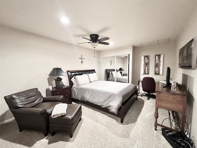 bedroom with light colored carpet and ceiling fan