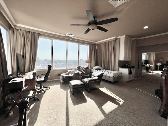 interior space with ornamental molding and ceiling fan