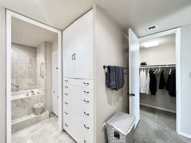 bathroom featuring plus walk in shower