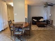 dining space with ceiling fan