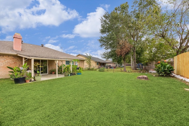 view of yard with a patio area