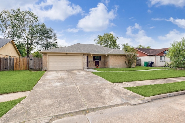 ranch-style home featuring a front lawn and a garage