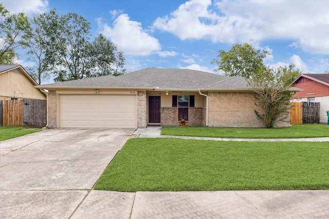 single story home featuring a front yard and a garage