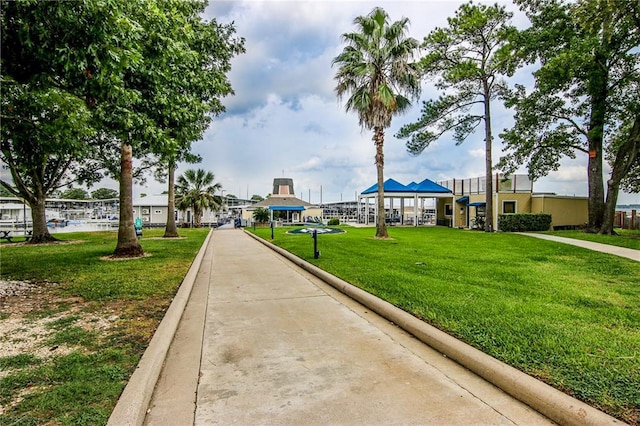 12100 Melville Dr Unit 402D, Montgomery, TX 77356 - view of property's community with a yard