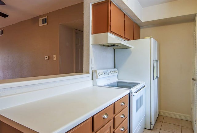 kitchen with white range with electric stovetop, ceiling fan, and light tile patterned floors