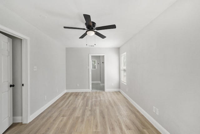 unfurnished bedroom with light hardwood / wood-style flooring and ceiling fan