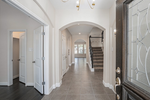 foyer entrance featuring dark hardwood / wood-style floors