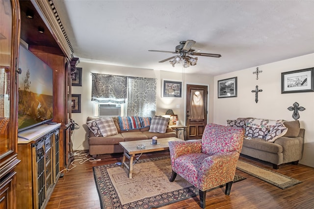 living room with ceiling fan, cooling unit, and dark hardwood / wood-style flooring