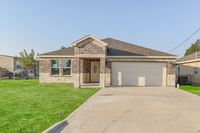 view of front facade with a front lawn and a garage