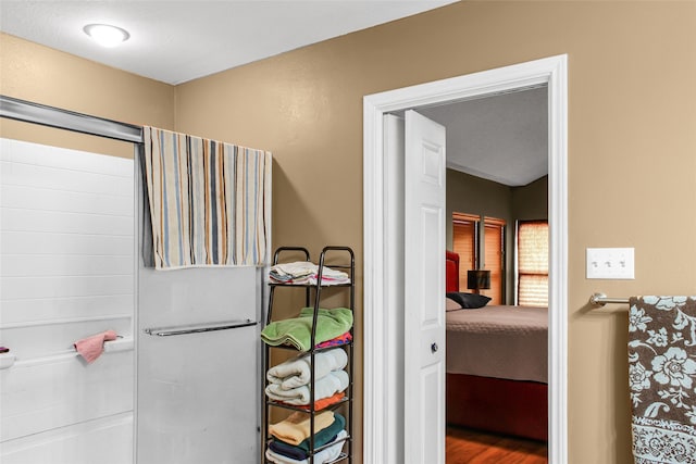 bathroom featuring wood-type flooring