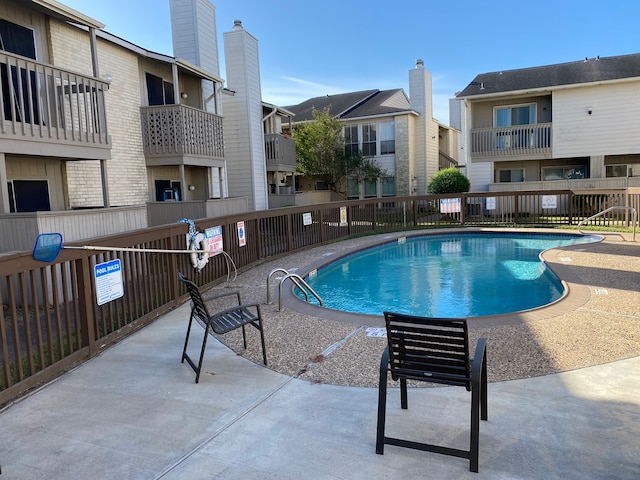 view of pool with a patio