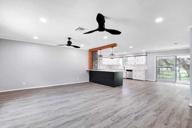 unfurnished living room featuring ceiling fan, ornamental molding, and light hardwood / wood-style flooring