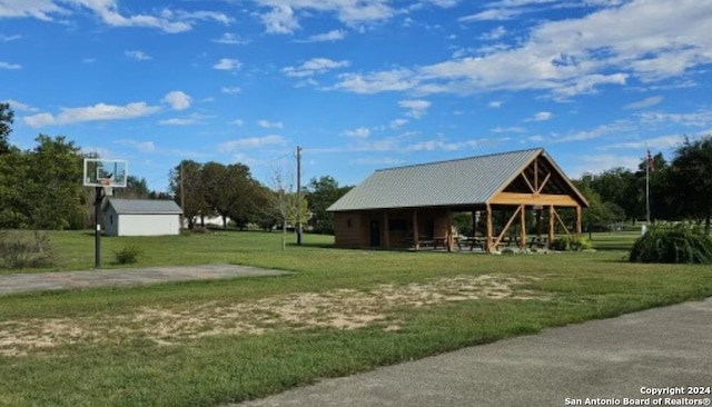 view of community featuring a lawn