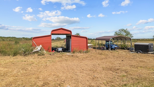 view of outbuilding featuring a carport