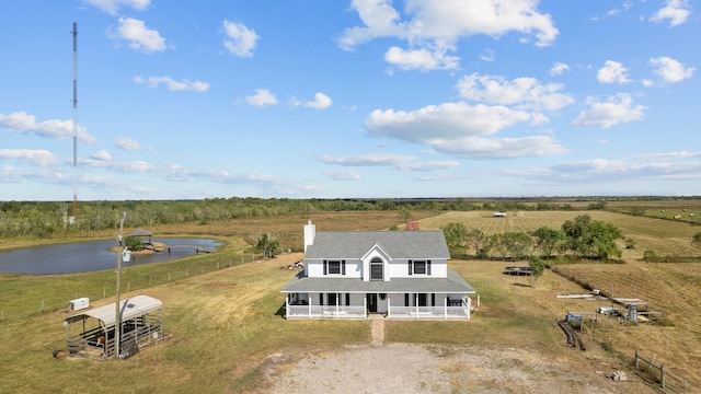 bird's eye view featuring a rural view and a water view