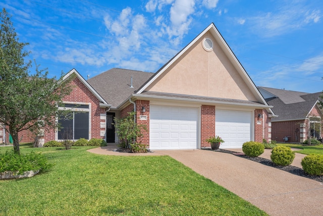 view of front of house with a front yard and a garage