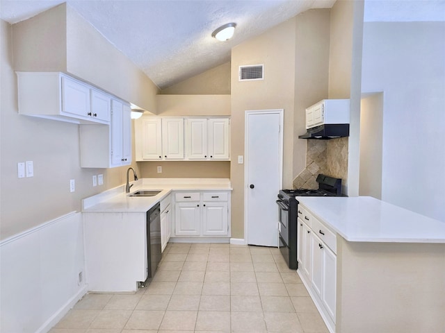 kitchen with sink, black appliances, light tile patterned floors, white cabinets, and high vaulted ceiling