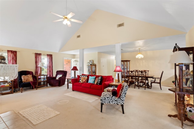 living room with light carpet, high vaulted ceiling, and ceiling fan