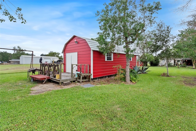 view of outdoor structure with a yard