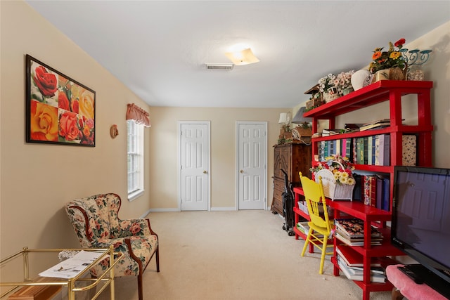 living area with carpet floors