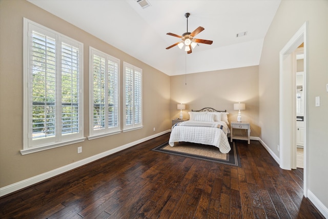 bedroom featuring multiple windows, ceiling fan, and dark wood-type flooring