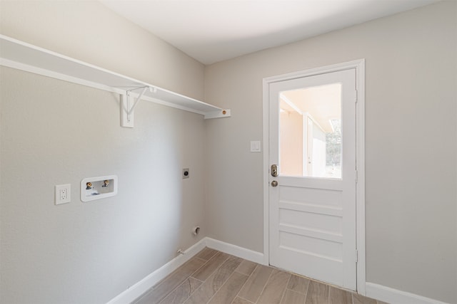 laundry room with light hardwood / wood-style floors, hookup for an electric dryer, and washer hookup