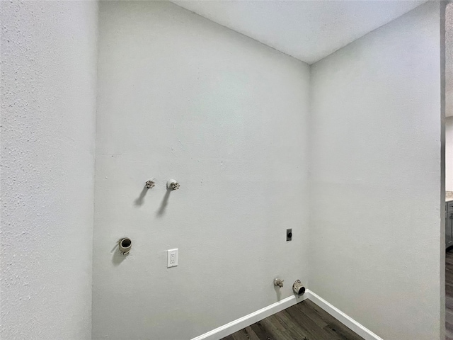 laundry room with hookup for an electric dryer, gas dryer hookup, dark hardwood / wood-style flooring, and hookup for a washing machine