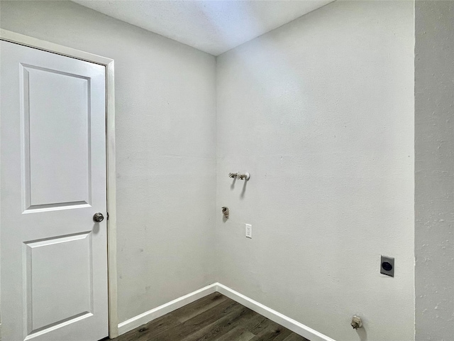 washroom featuring hookup for an electric dryer and wood-type flooring