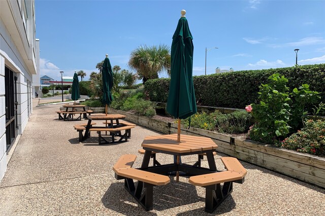 6102 Seawall Blvd Unit 161, Galveston, TX 77551 - view of home's community with a patio area