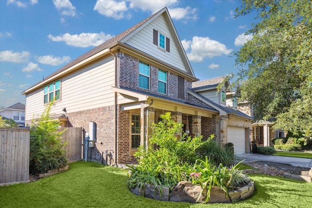 view of side of property with a lawn and a garage