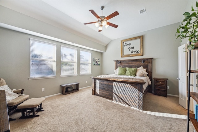 bedroom with ceiling fan, light carpet, and lofted ceiling