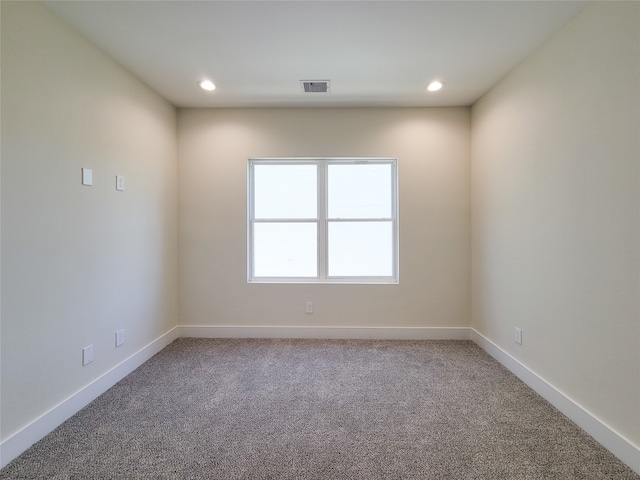 view of carpeted spare room