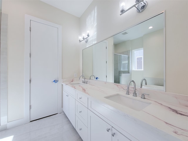 bathroom featuring vanity and shower with separate bathtub