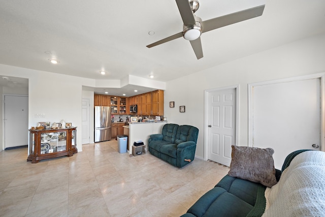 living room with ceiling fan