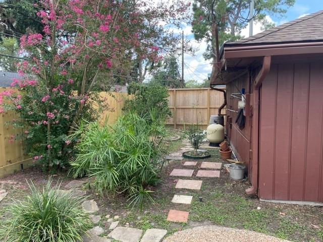 view of yard with fence